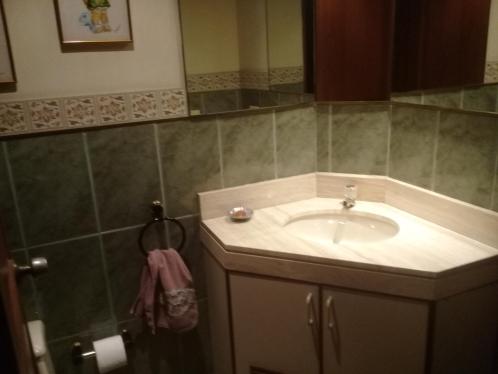 Baño de servicio