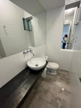 Baño de servicio